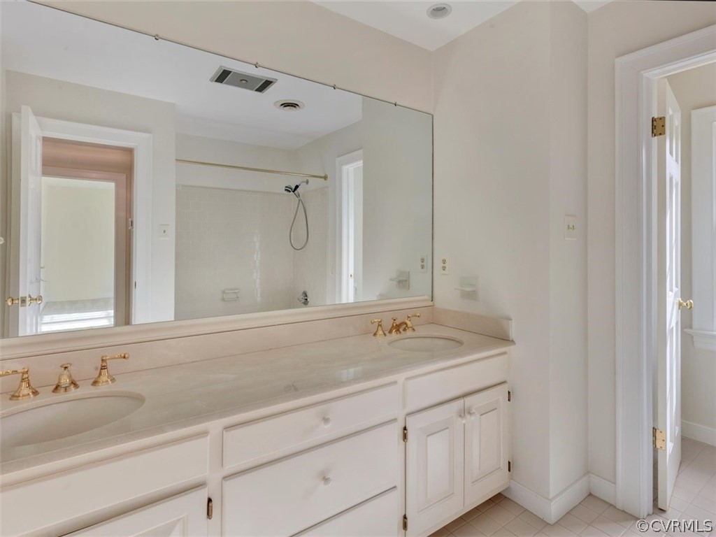 3900 Timber Ridge Road Midlothian, VA 23112 - Photo 34 of 44 a bathroom with a sink and a mirror