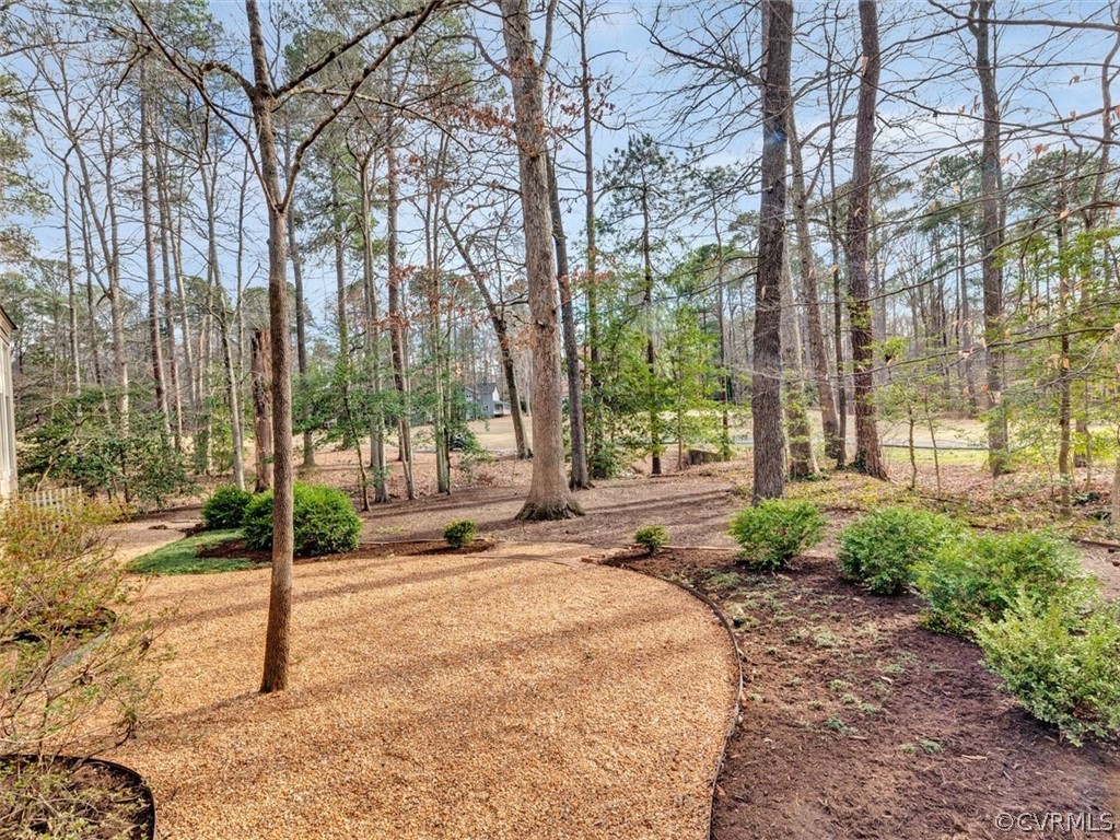 3900 Timber Ridge Road Midlothian, VA 23112 - Photo 36 of 44 a house with trees in front of it