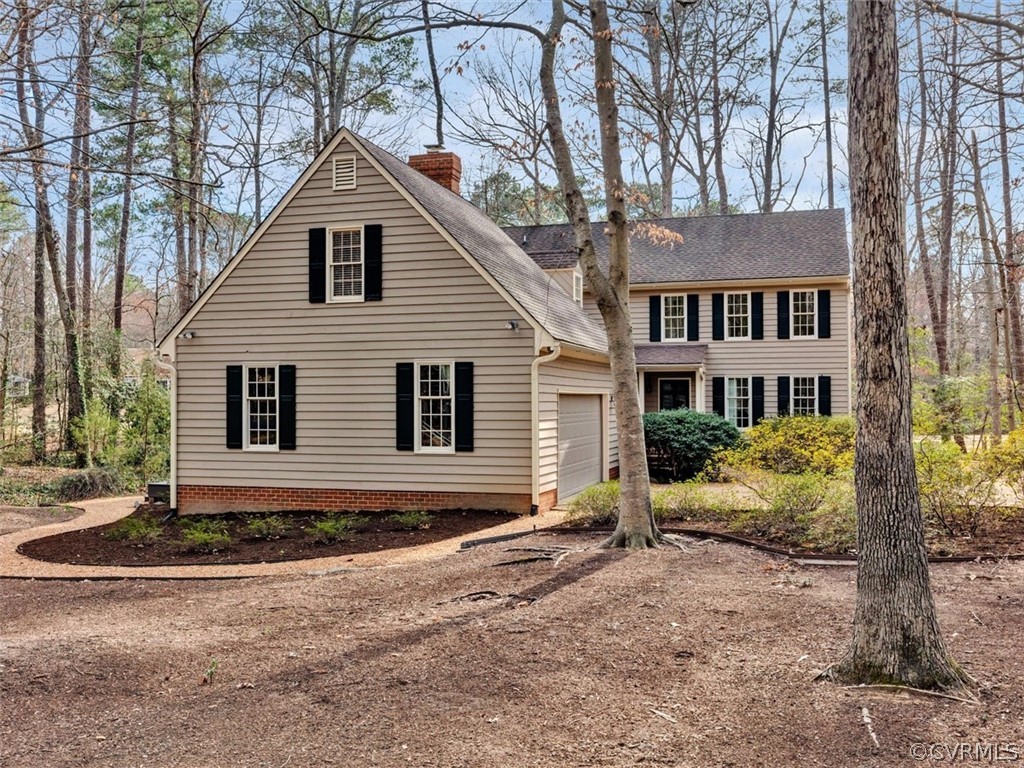 3900 Timber Ridge Road Midlothian, VA 23112 - Photo 41 of 44 a front view of a house with garden