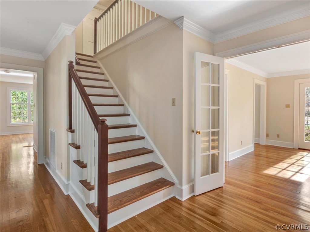 3900 Timber Ridge Road Midlothian, VA 23112 - Photo 7 of 44 a view of a hallway with wooden floor and entryway