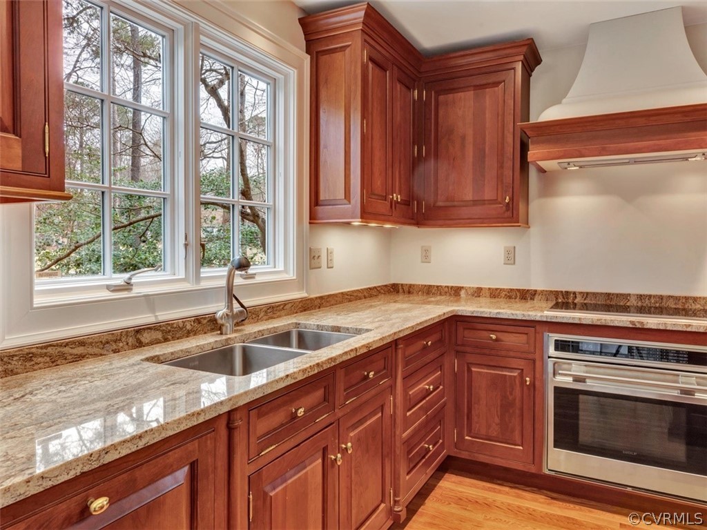 3900 Timber Ridge Road Midlothian, VA 23112 - Photo 10 of 44 a kitchen with granite countertop a sink and a stove