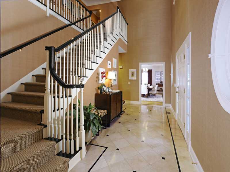 2 Buxton Lane Riverside, CT 06878 - Photo 3 of 19 a view of entryway and hall with wooden floor