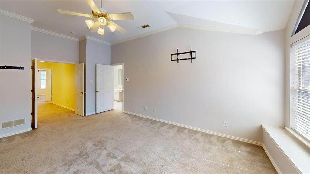 18240 Midway Road, Unit 1204 Dallas, TX 75287 - Photo 9 of 27 a view of an empty room with a window