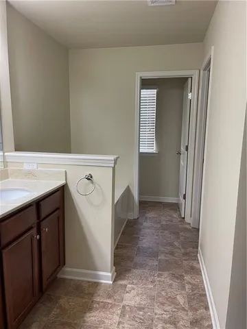 a view of a kitchen with a sink and a dishwasher