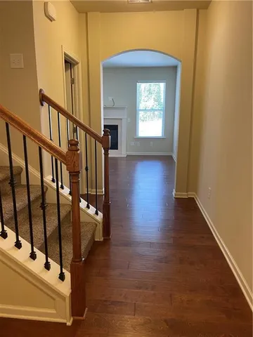 a view of entryway with wooden floor