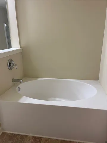 a bathroom with bathtub
