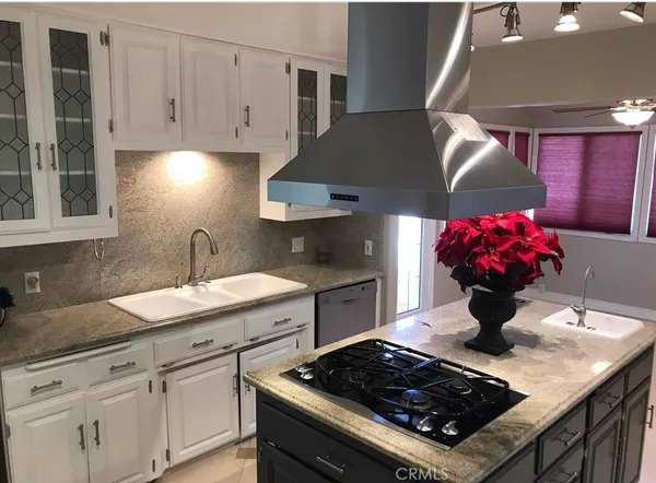 a living room with table and chairs