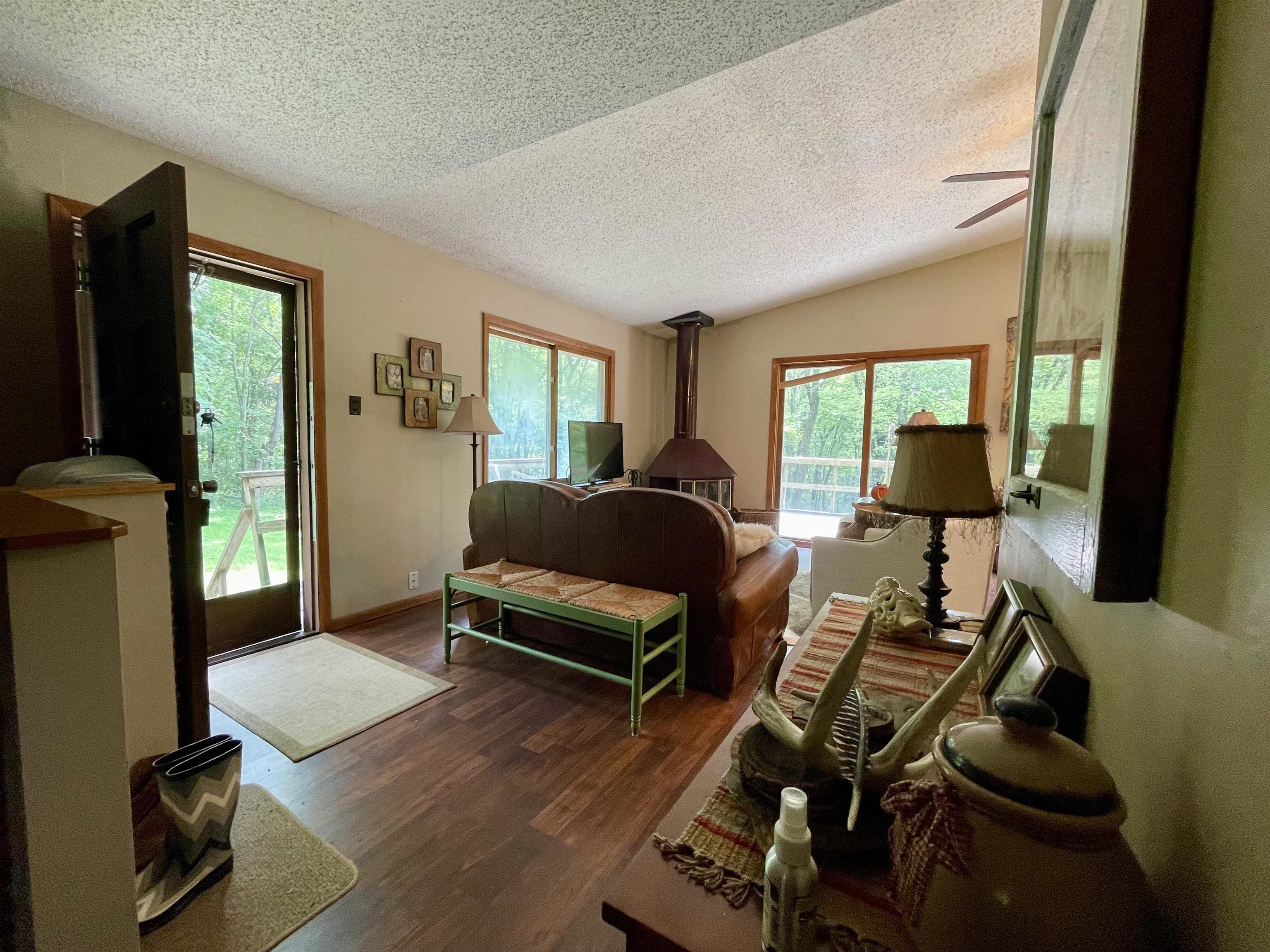 8008 West Blanding Road Hanover, IL 61041 - Photo 17 of 67 a living room with furniture rug and wooden floor