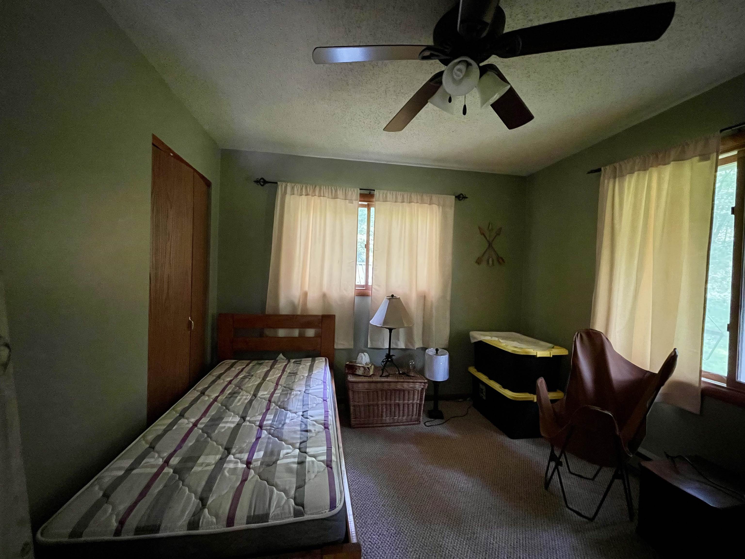 8008 West Blanding Road Hanover, IL 61041 - Photo 39 of 67 a bedroom with furniture and a window