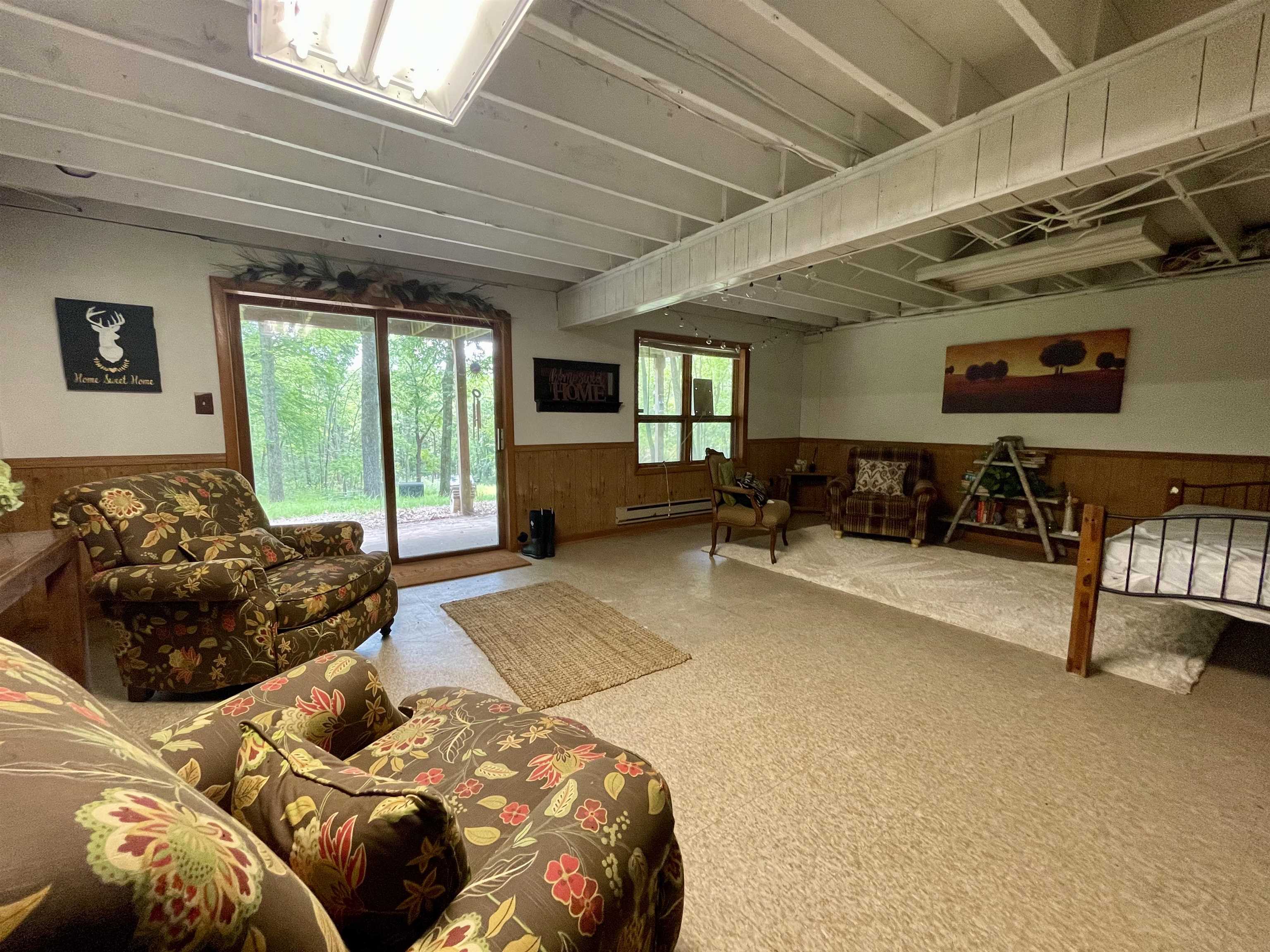 8008 West Blanding Road Hanover, IL 61041 - Photo 46 of 67 a bedroom with furniture and a large window