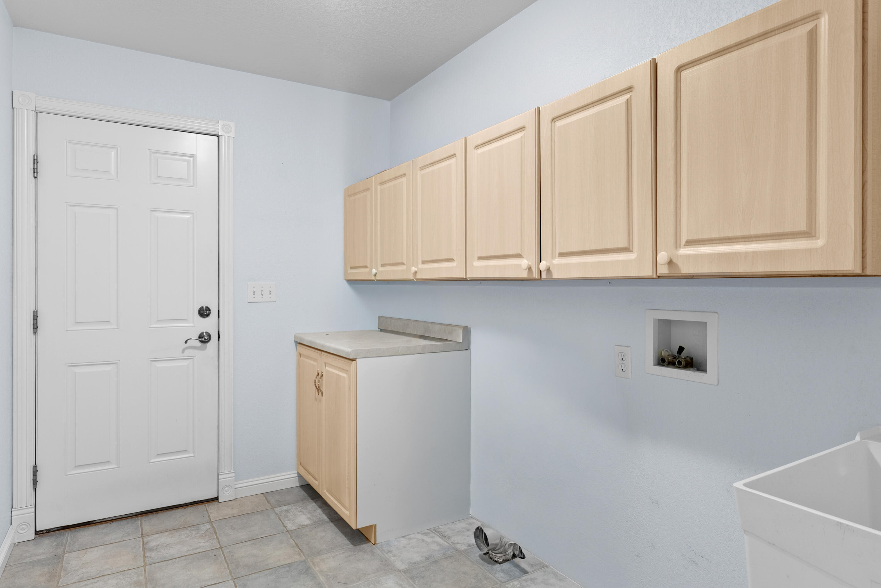 3919 Golfview Drive Two Rivers, WI 54241 - Photo 18 of 31 Laundry off garage