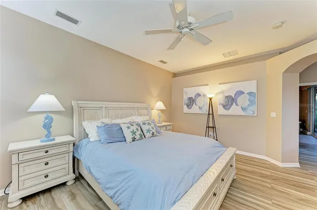 a view of empty room and wooden floor