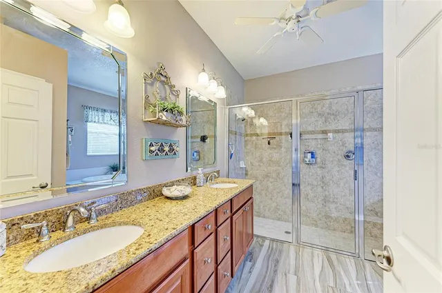 a view of outdoor sitting area with furniture and backyard
