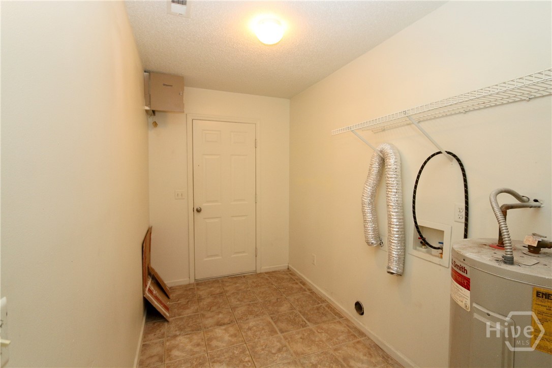 2352 Rowe Street Hinesville, GA 31313 - Photo 23 of 25 Large Laundry room off the kitchen with garage access