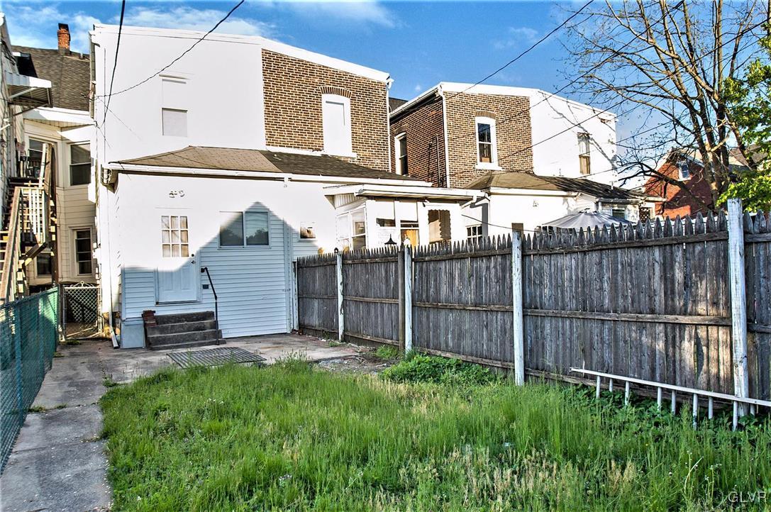 917 High Street Bethlehem, PA 18018 - Photo 24 of 25 a view of a house with a wooden fence and a bench
