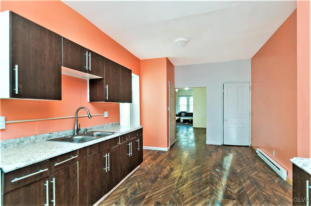 917 High Street Bethlehem, PA 18018 - Photo 10 of 25 a kitchen with stainless steel appliances granite countertop a sink and cabinets