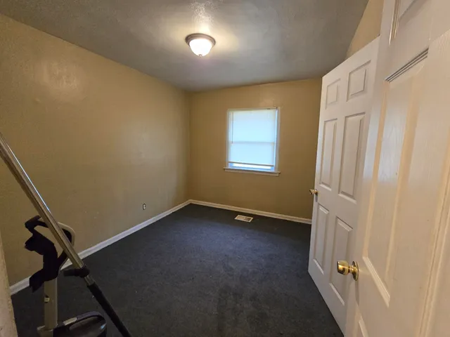 a bathroom with a toilet a sink and bathtub