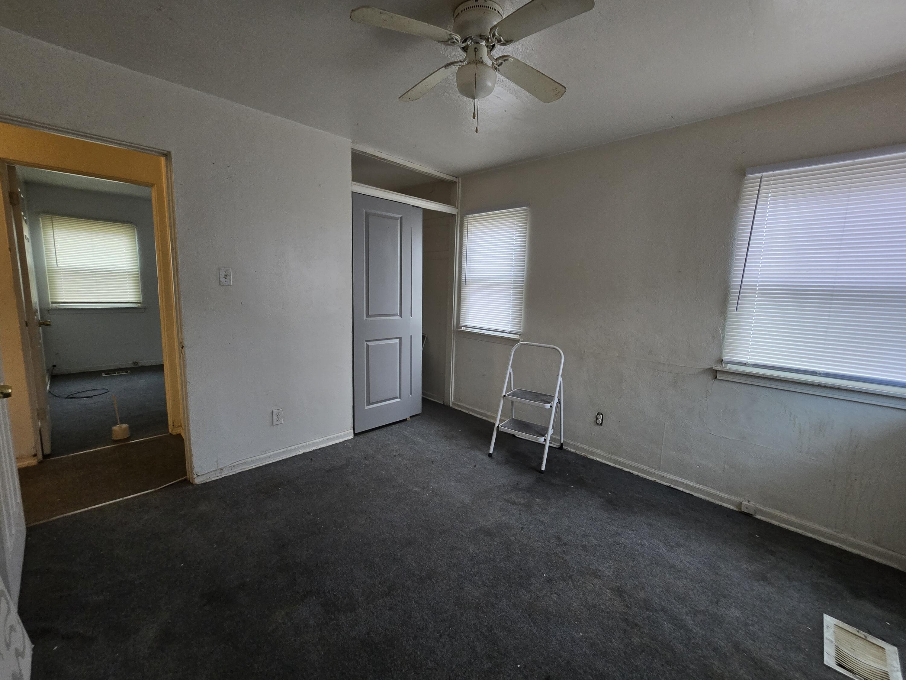 1119 Cass Street Gary, IN 46403 - Photo 14 of 20 an empty room with a view of a bathroom