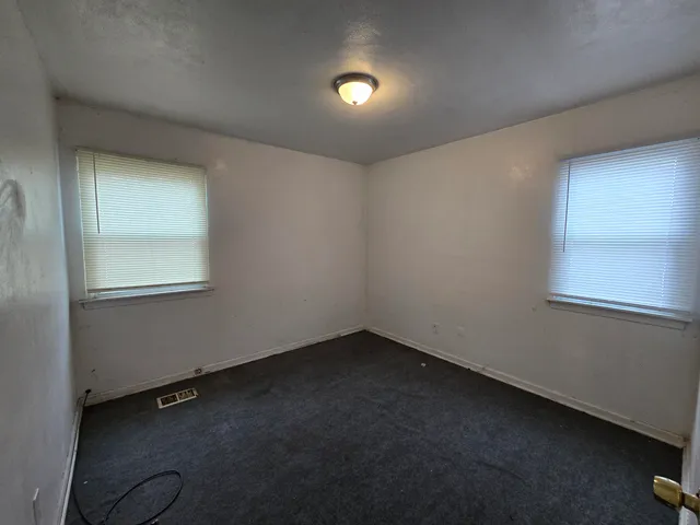 an empty room with a door