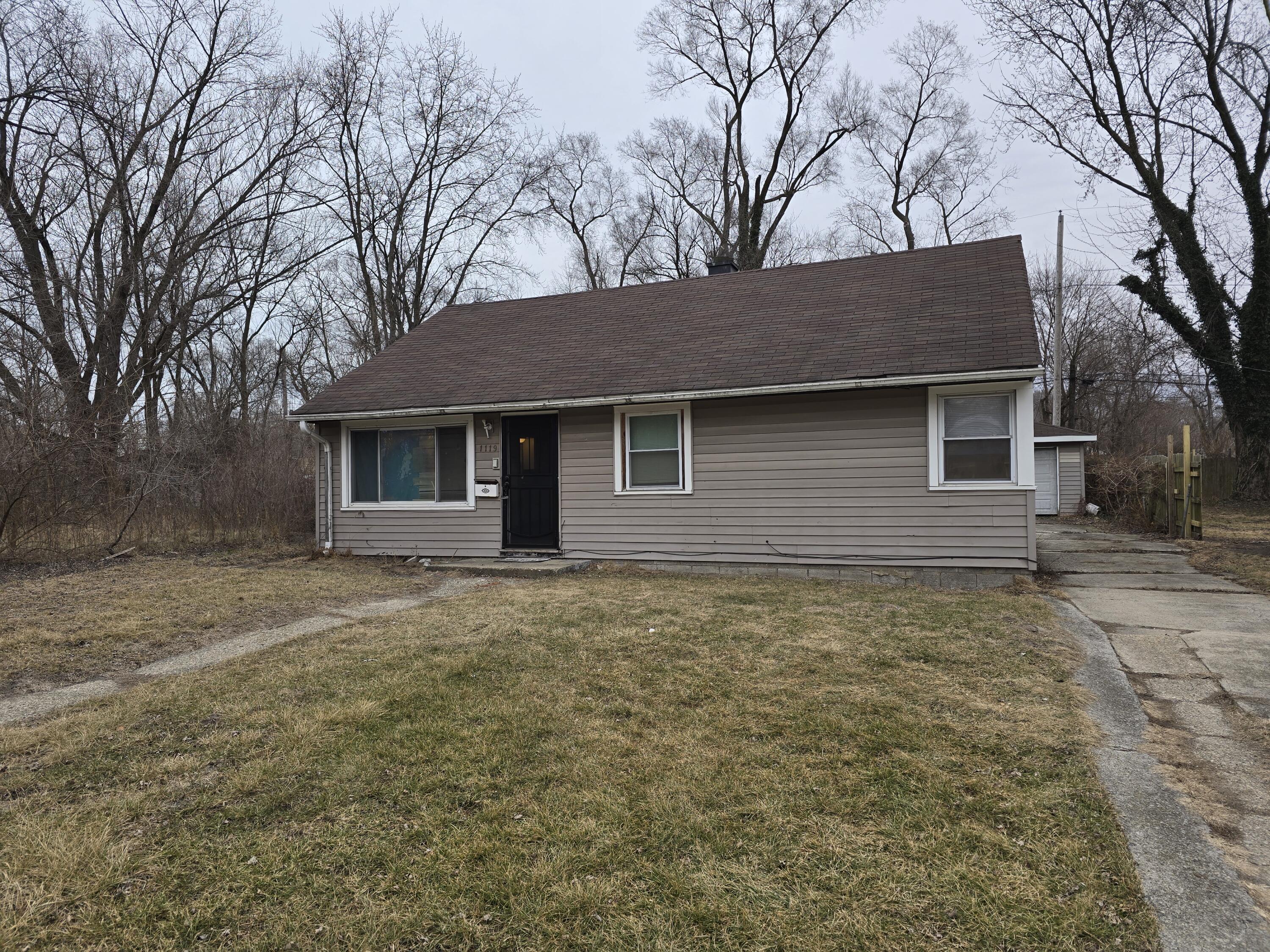 1119 Cass Street Gary, IN 46403 - Photo 20 of 20 a backyard of a house