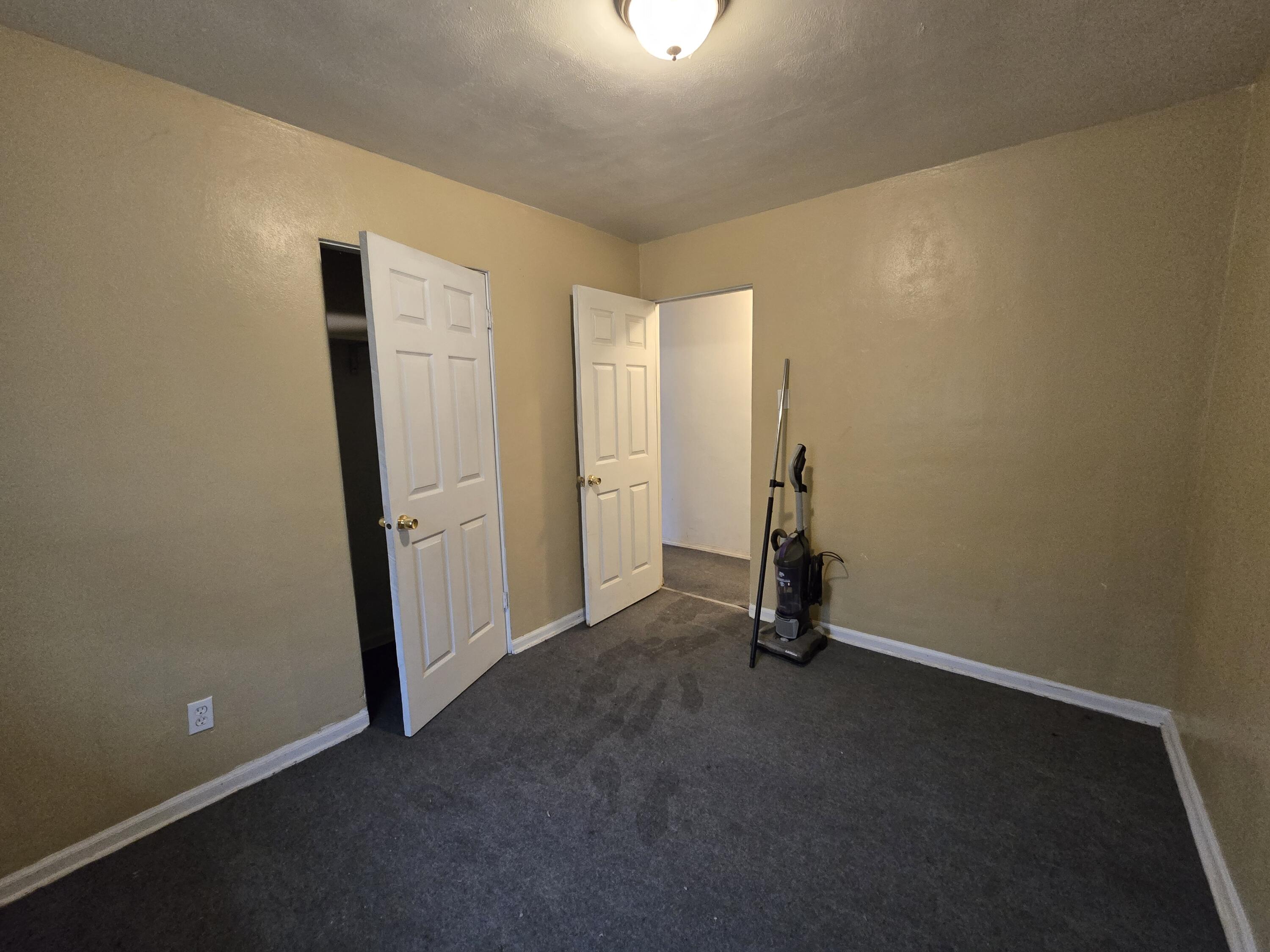 1119 Cass Street Gary, IN 46403 - Photo 10 of 20 an empty room with windows