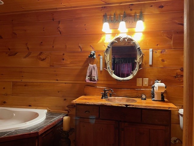 911 Summit Way Blairsville, GA 30512 - Photo 11 of 15 a bathroom with a sink and a mirror