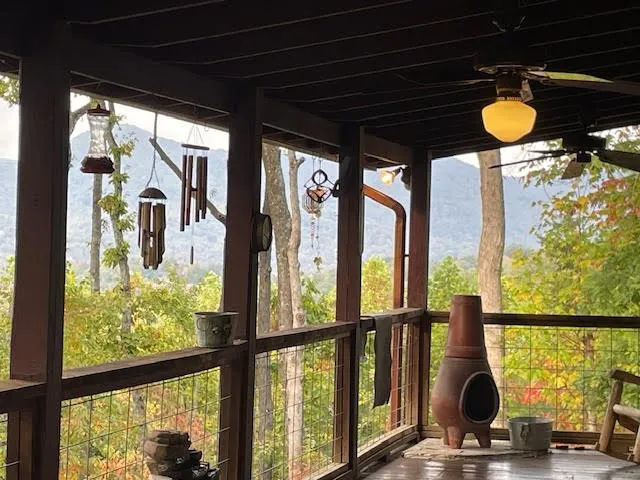 a view of swimming pool with furniture