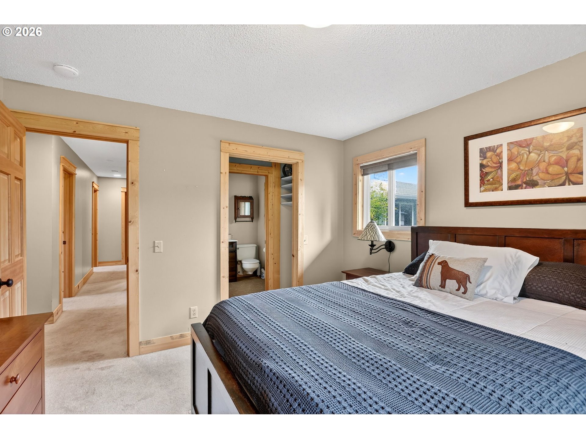 9732 Southeast Ladera Court Damascus, OR 97089 - Photo 23 of 41 a bedroom with a bed and a large mirror