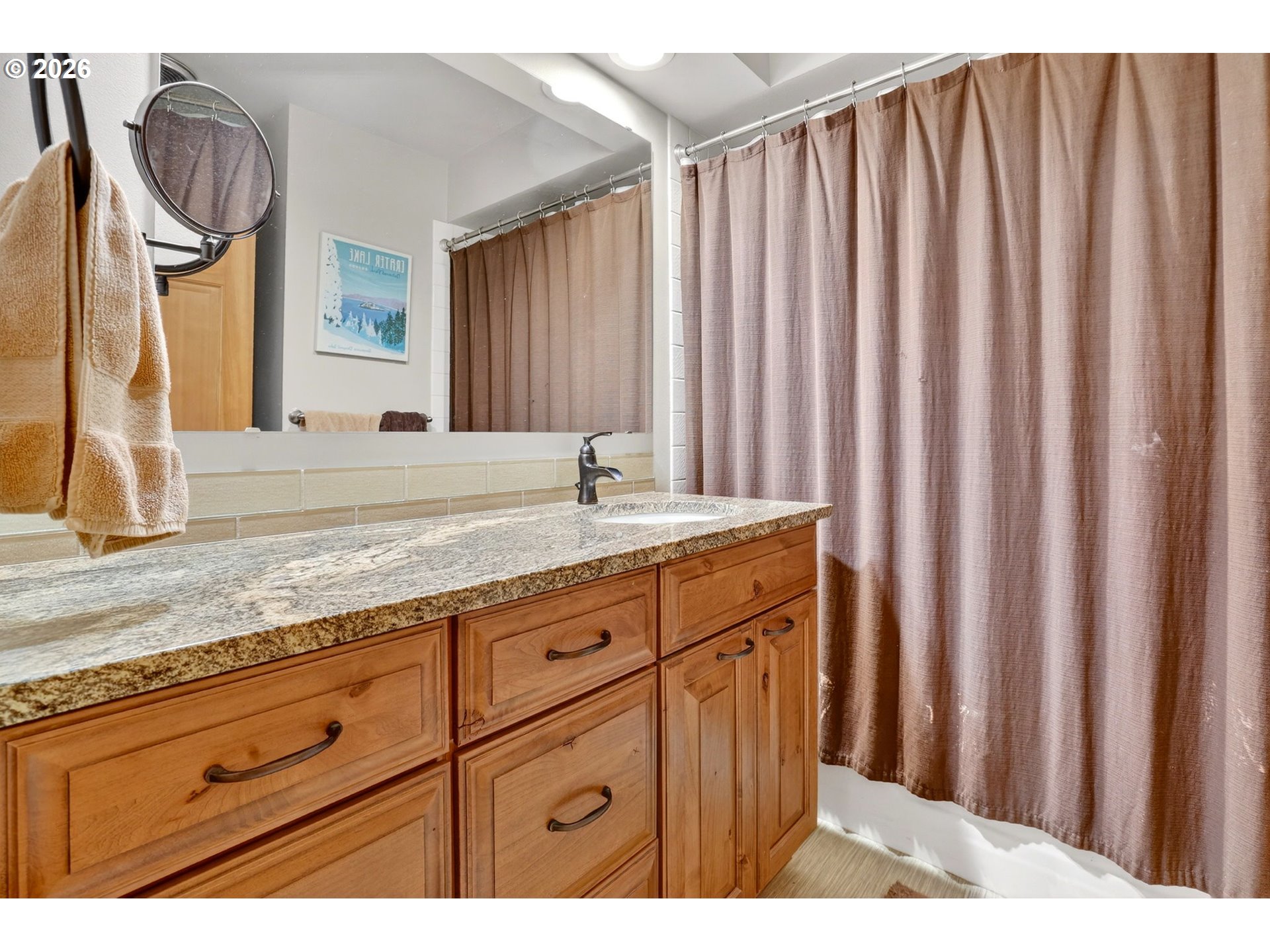 9732 Southeast Ladera Court Damascus, OR 97089 - Photo 27 of 41 a bathroom with a granite countertop sink and a mirror