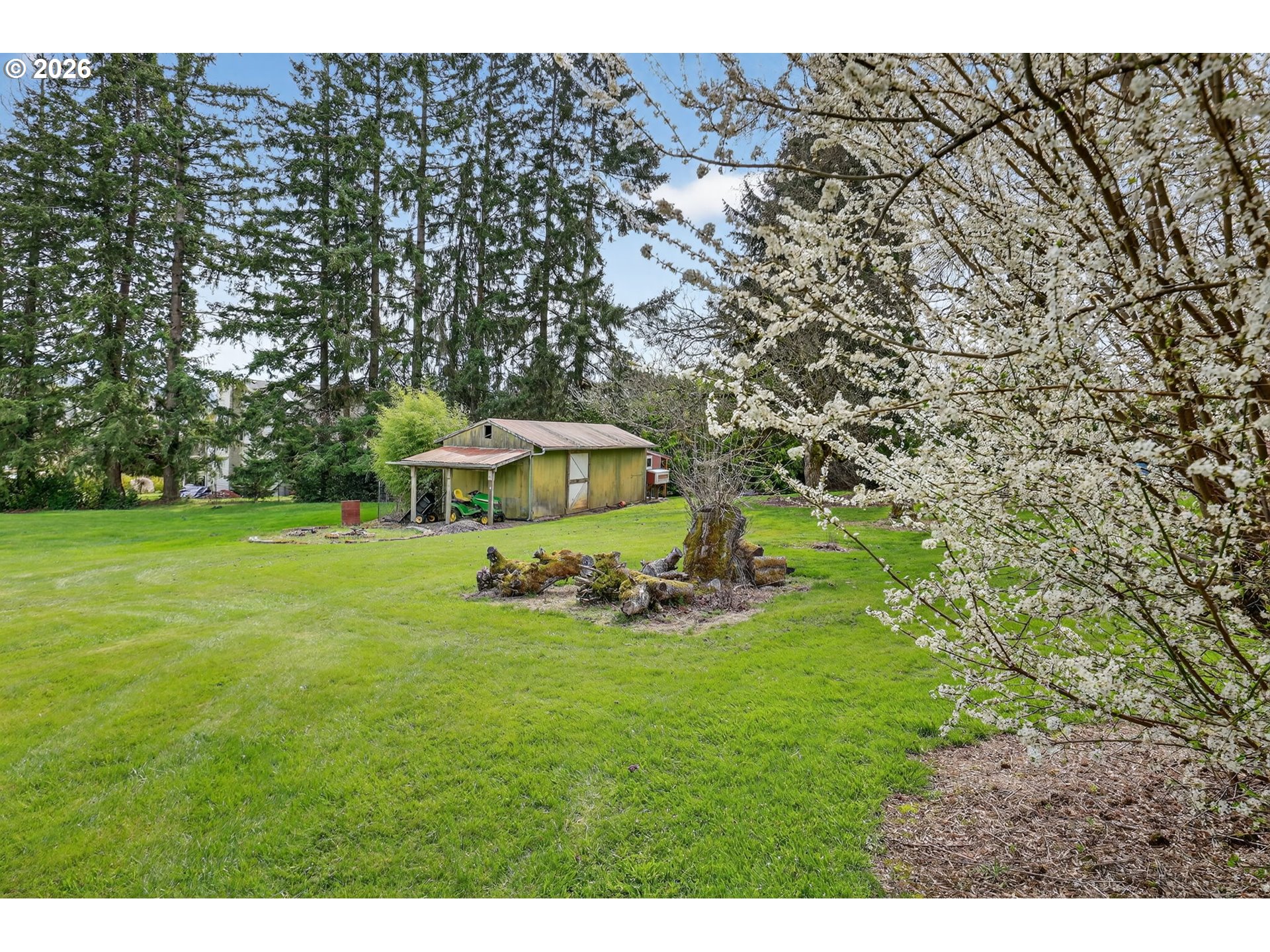 9732 Southeast Ladera Court Damascus, OR 97089 - Photo 31 of 41 a view of a house with a yard