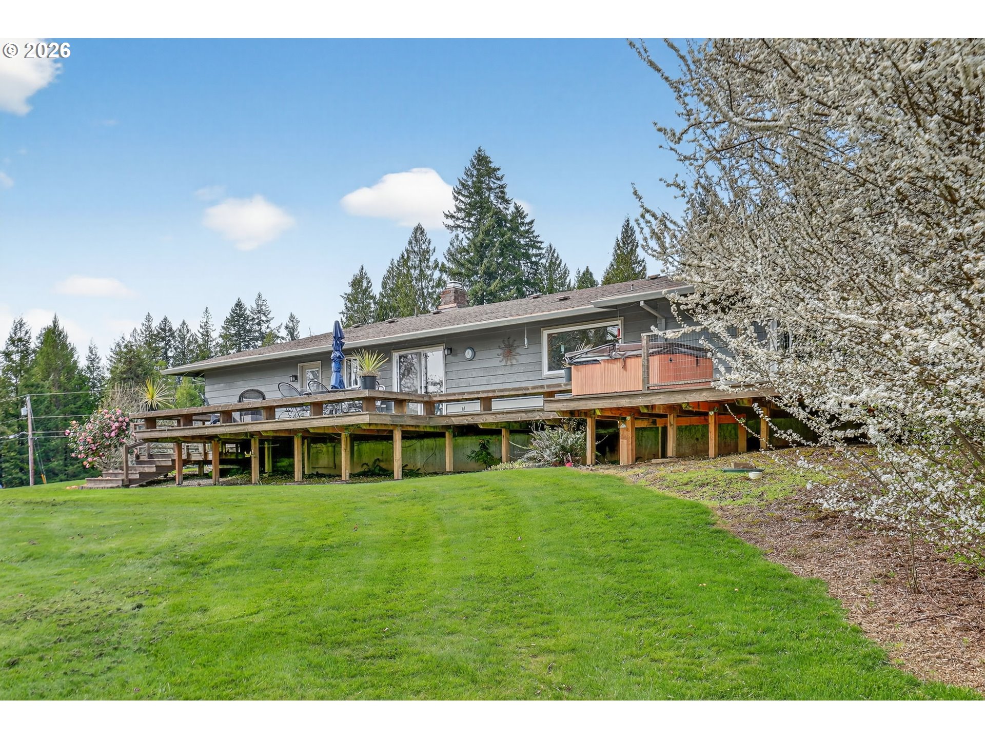 9732 Southeast Ladera Court Damascus, OR 97089 - Photo 32 of 41 a house view with a garden space