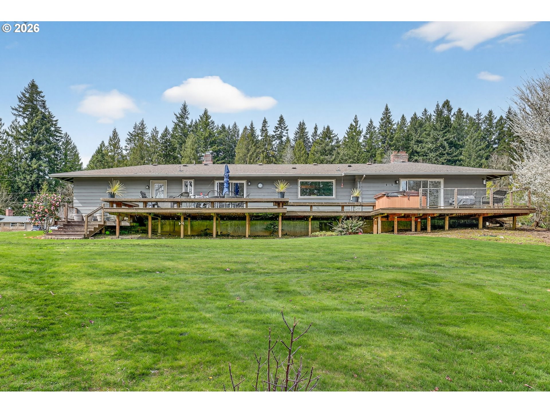 9732 Southeast Ladera Court Damascus, OR 97089 - Photo 33 of 41 a view of a house with a big yard