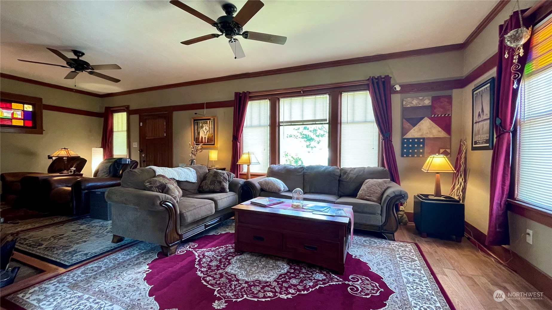 623 2nd Avenue Aberdeen, WA 98520 - Photo 12 of 40 a living room with furniture ceiling fan and a rug