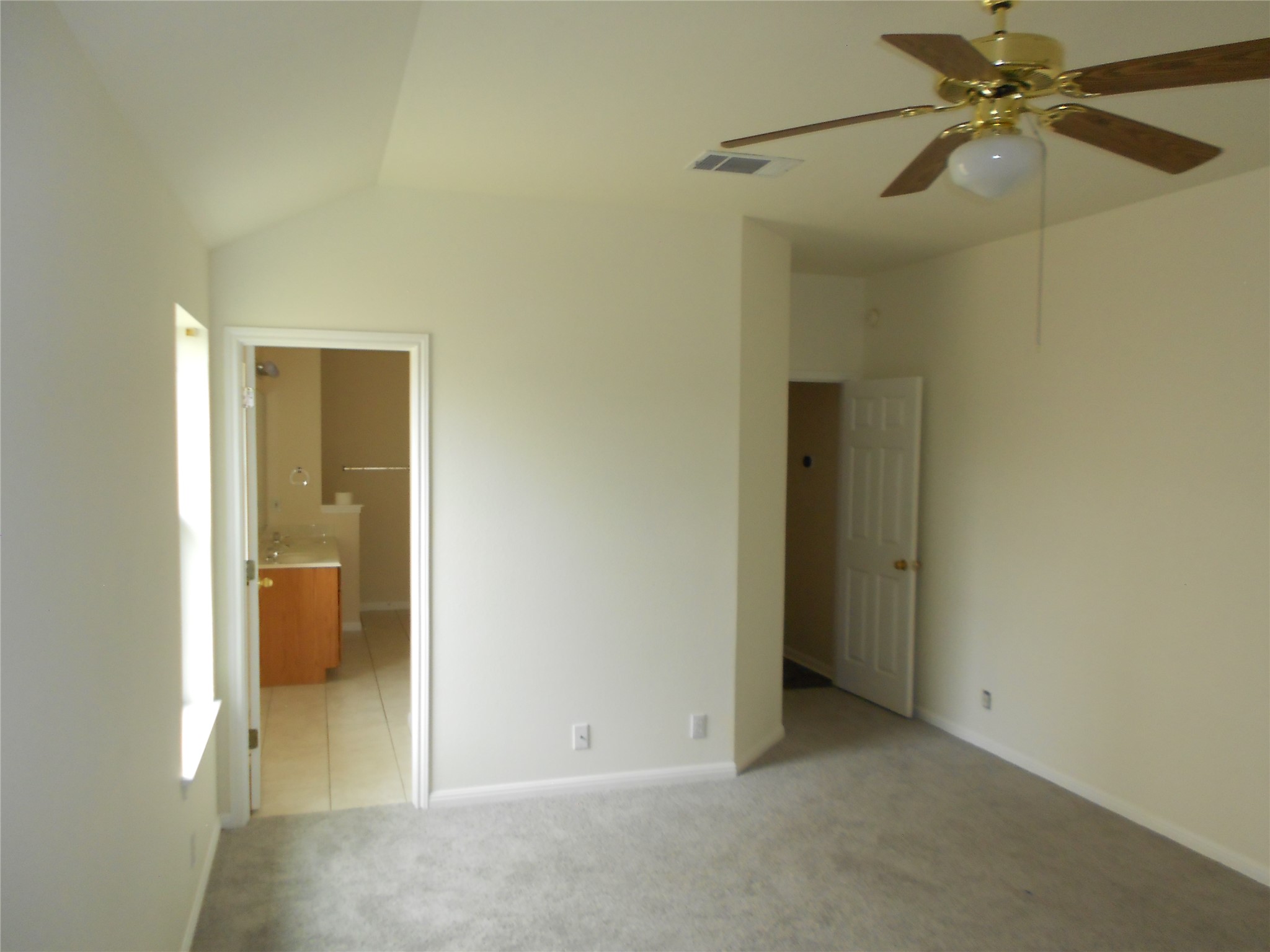701 Los Robles Road Leander, TX 78641 - Photo 22 of 38 Primary Bathroom to Left and Entry Hallway to Right