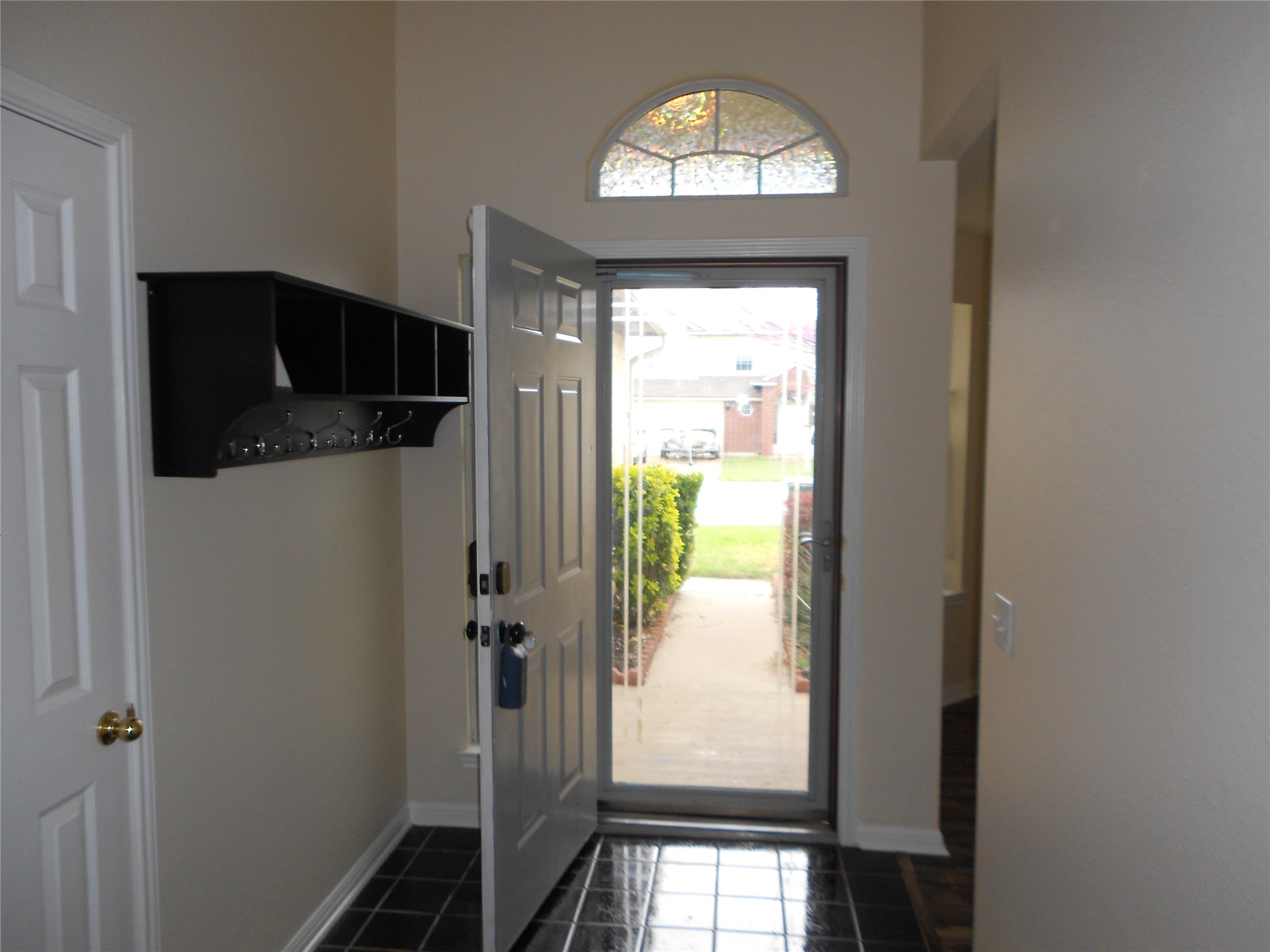 701 Los Robles Road Leander, TX 78641 - Photo 5 of 38 Really Nice Entry with Bedrooms 2 & 3 and 2nd Bathroom to the Right