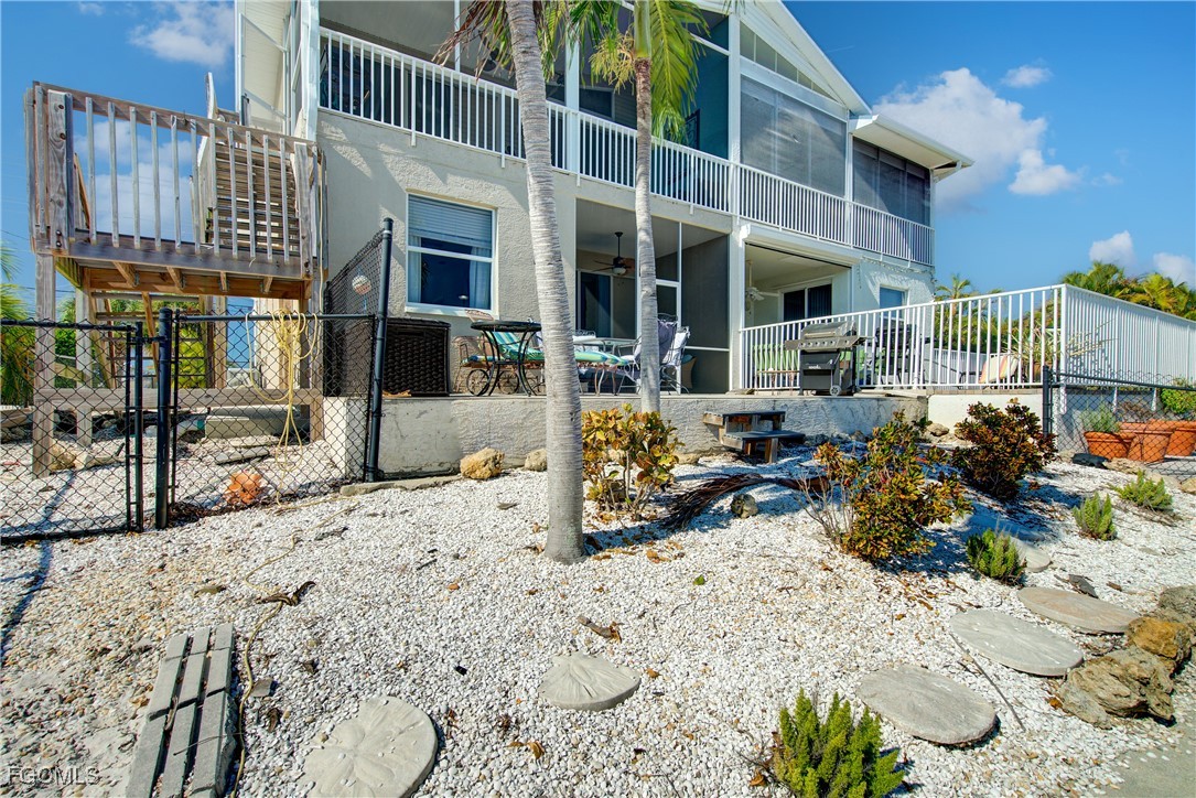 3184 Stringfellow Road St. James City, FL 33956 - Photo 15 of 46 a view of a dinning room with balcony