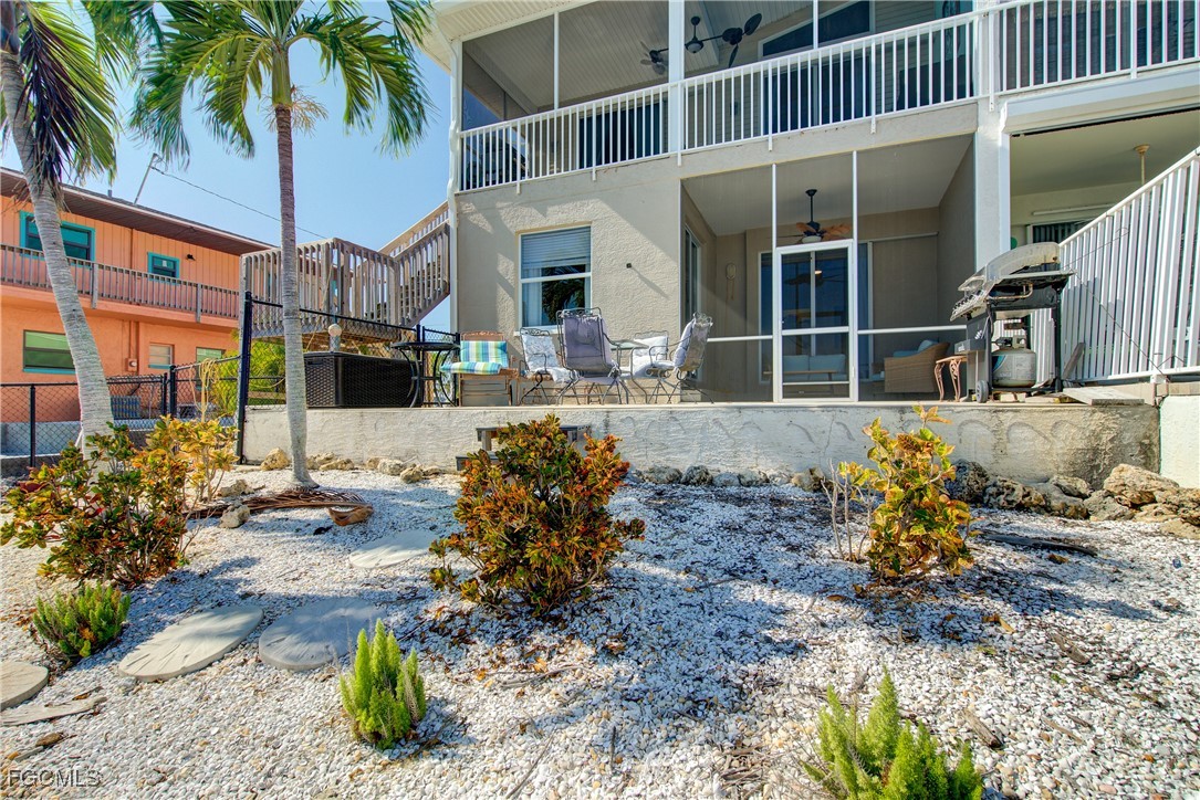 3184 Stringfellow Road St. James City, FL 33956 - Photo 6 of 46 a view of a house with a patio