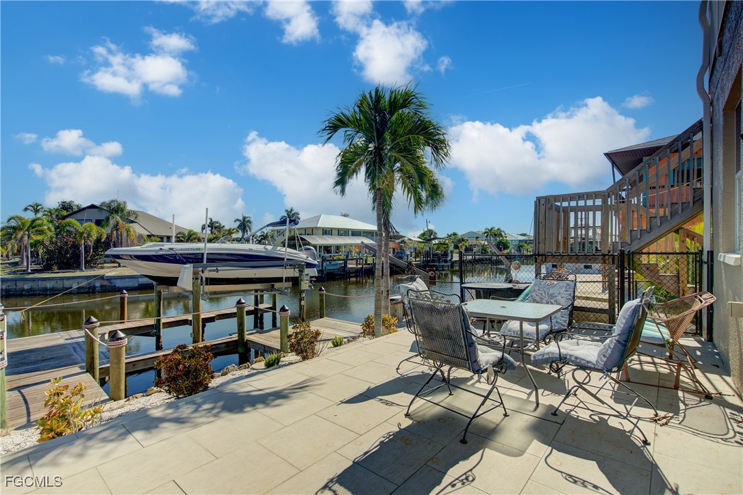 3184 Stringfellow Road St. James City, FL 33956 - Photo 7 of 46 a view of houses with lake view