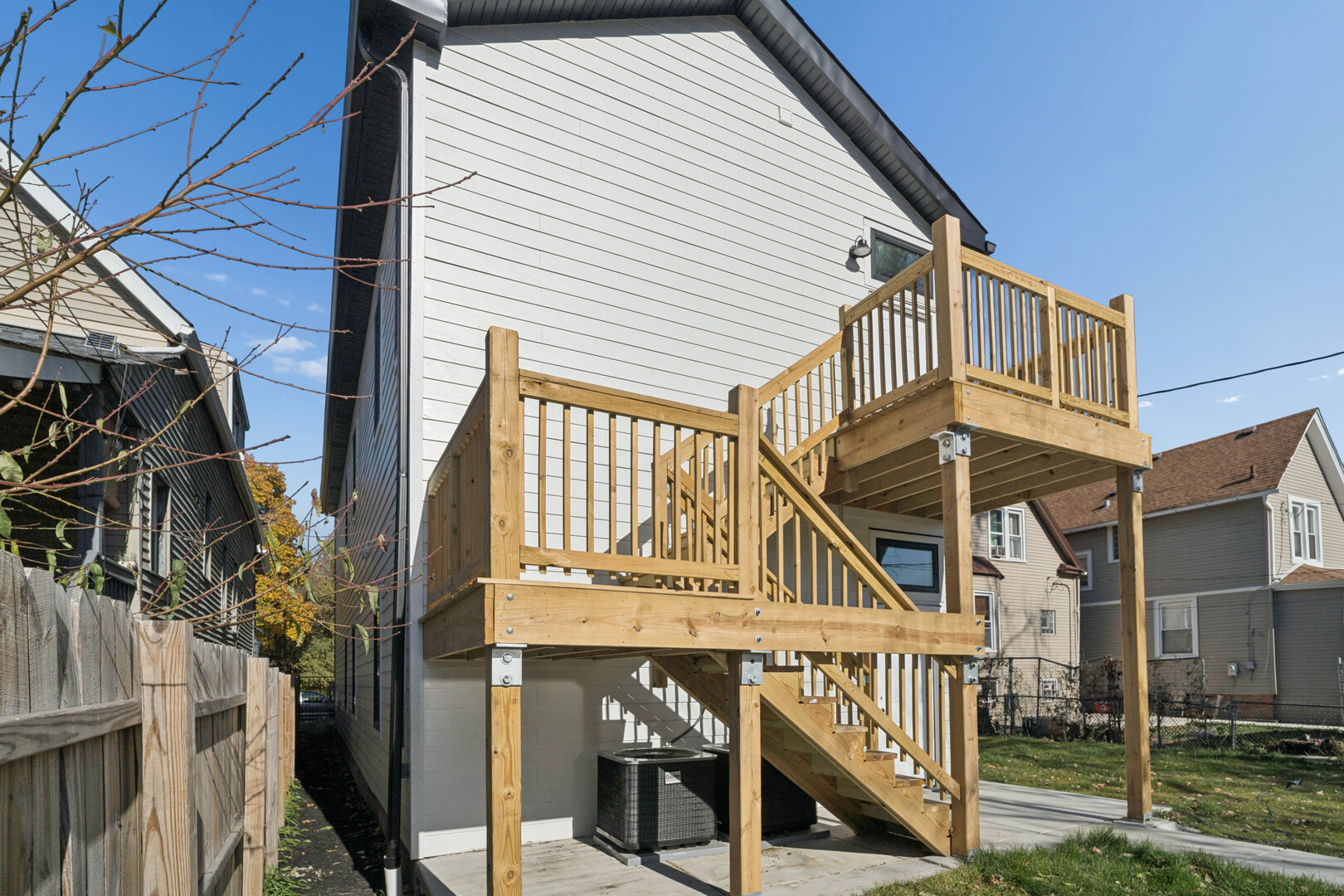 4839 West Huron Street, Unit 1 Chicago, IL 60644 - Photo 17 of 19 a view of a house with wooden stairs