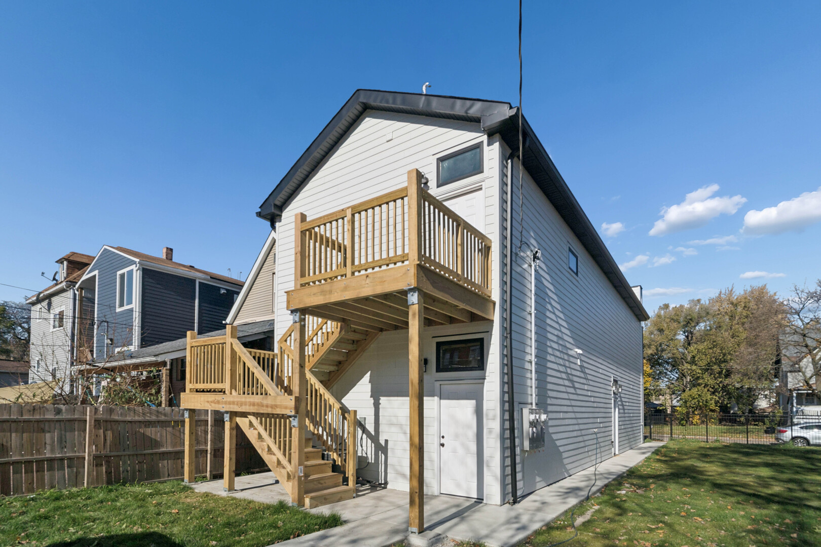 4839 West Huron Street, Unit 1 Chicago, IL 60644 - Photo 18 of 19 a front view of a house with a yard