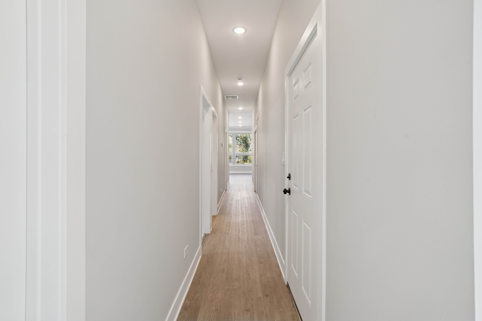 4839 West Huron Street, Unit 1 Chicago, IL 60644 - Photo 7 of 19 a view of a hallway with wooden floor