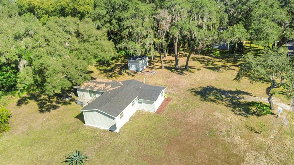 2716 Berdetta Street Leesburg, FL 34748 - Photo 2 of 35 a view of swimming pool with a yard