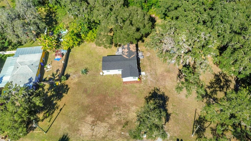 2716 Berdetta Street Leesburg, FL 34748 - Photo 26 of 35 an aerial view of a house with a yard
