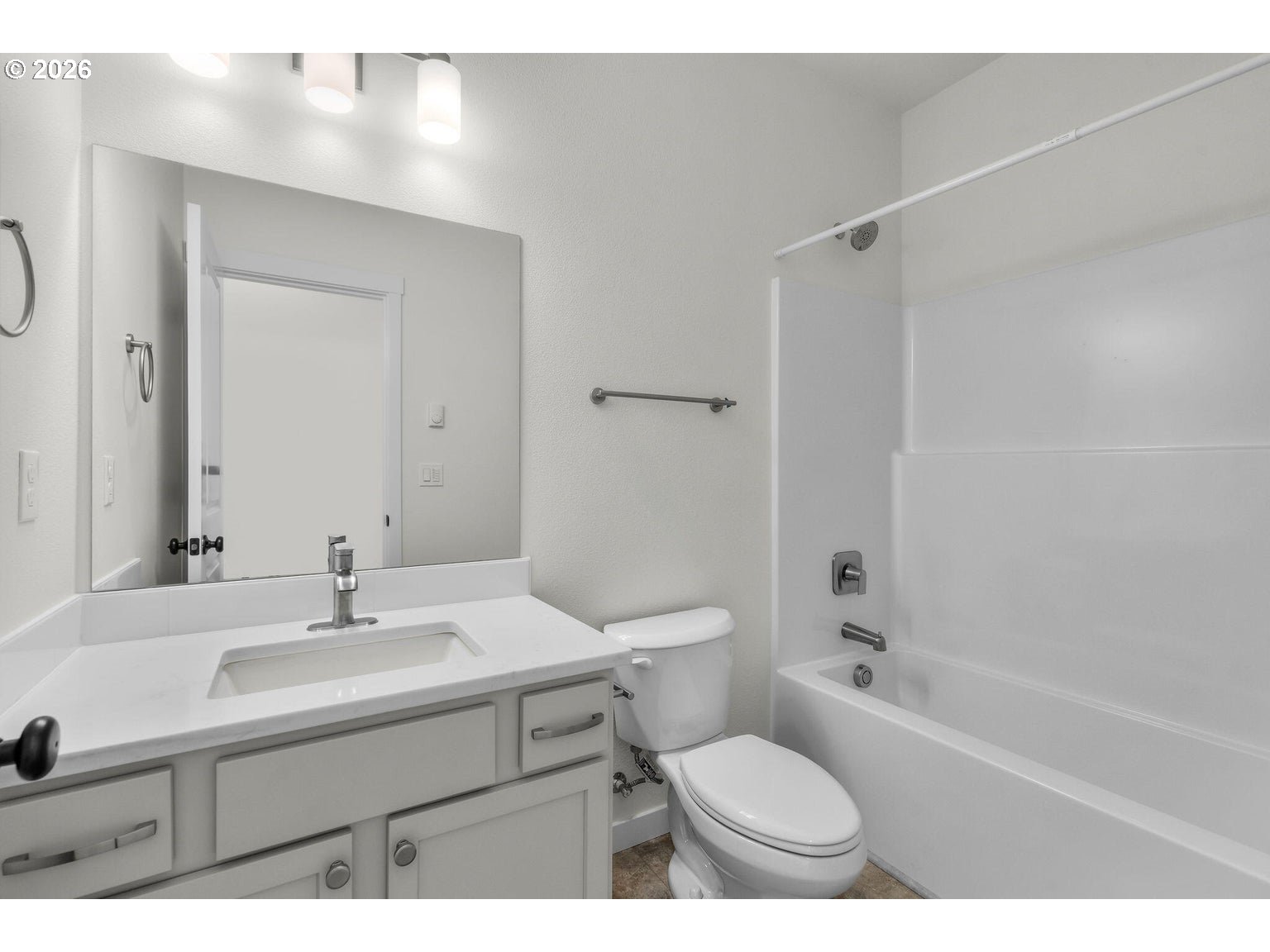 508 Southwest 6th Street Madras, OR 97741 - Photo 17 of 21 a bathroom with a sink toilet vanity and shower