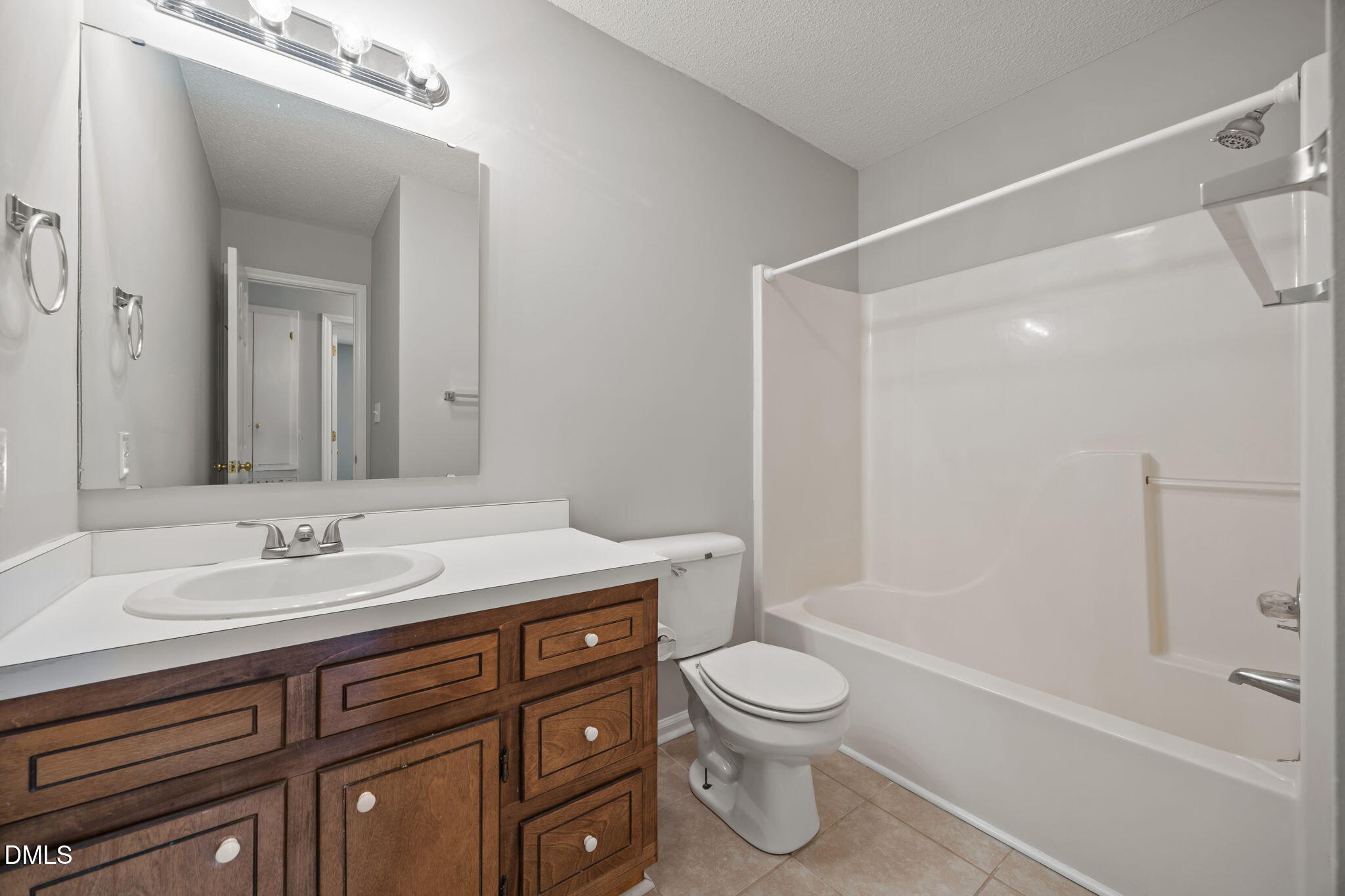 40 Circle Tree Lane Angier, NC 27501 - Photo 25 of 39 a bathroom with a sink a toilet and shower
