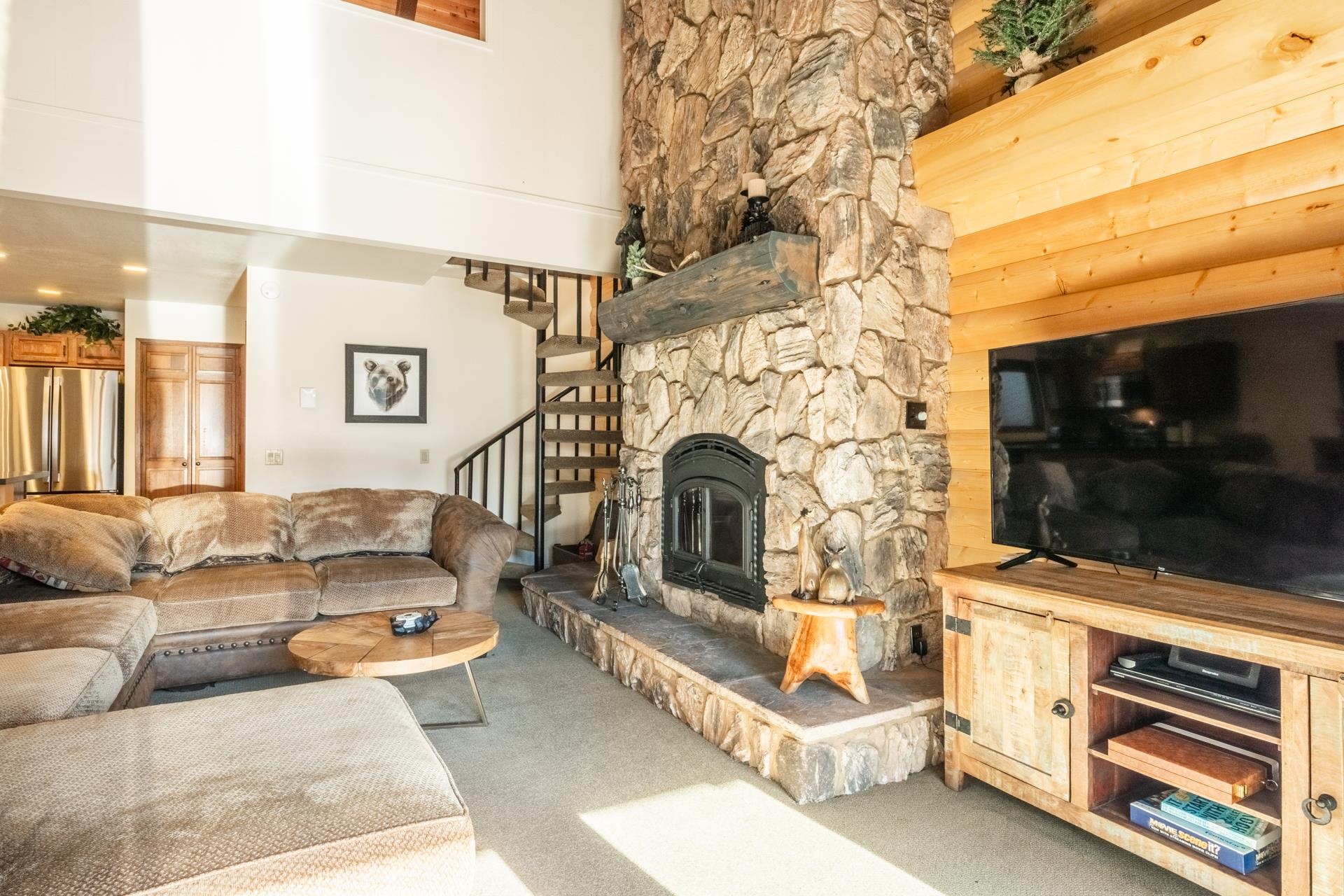 484 Manzanita Road, Unit 9 Mammoth Lakes, CA 93546 - Photo 21 of 39 a living room with furniture and a fireplace