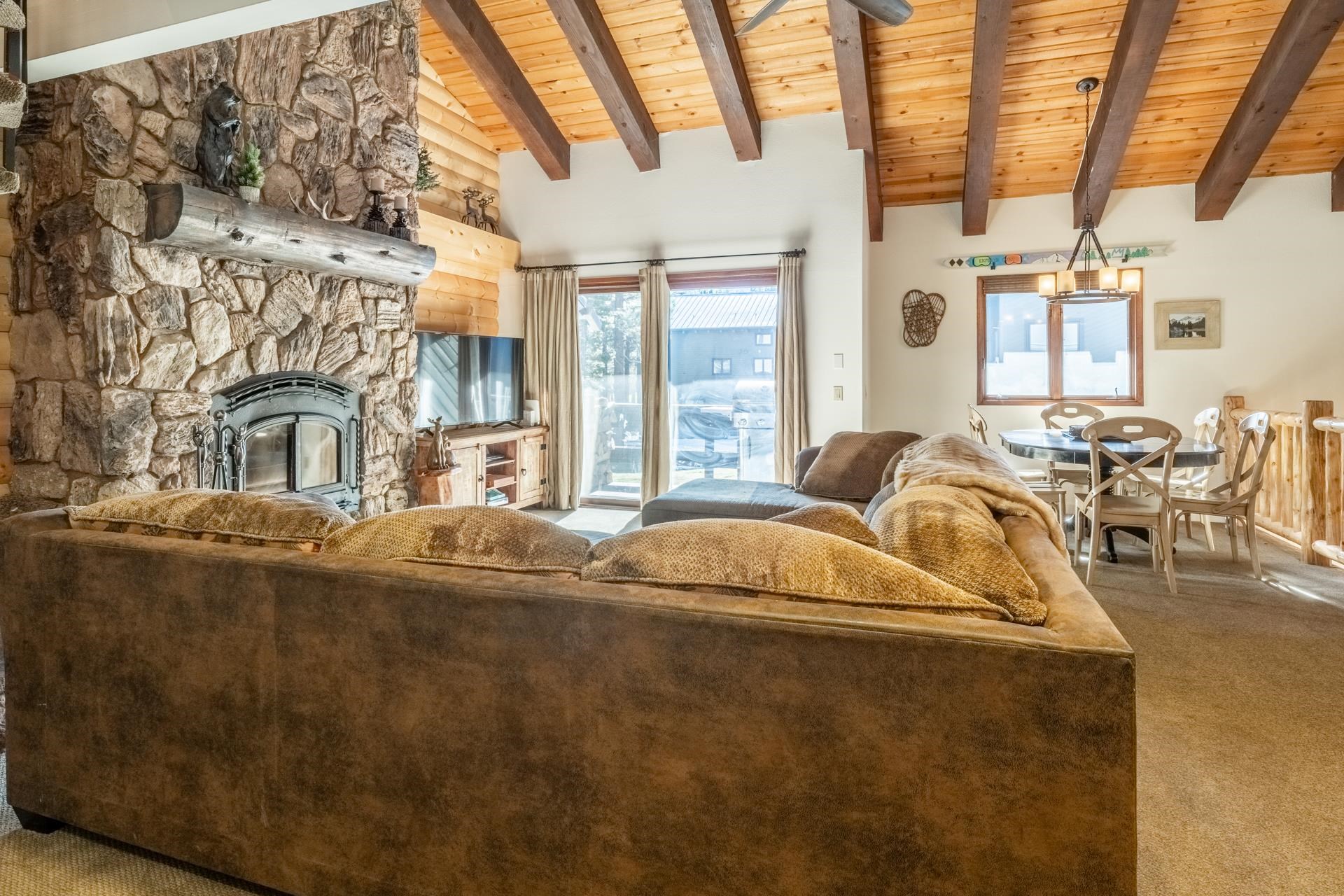 484 Manzanita Road, Unit 9 Mammoth Lakes, CA 93546 - Photo 25 of 39 a living room with fireplace furniture and a large window