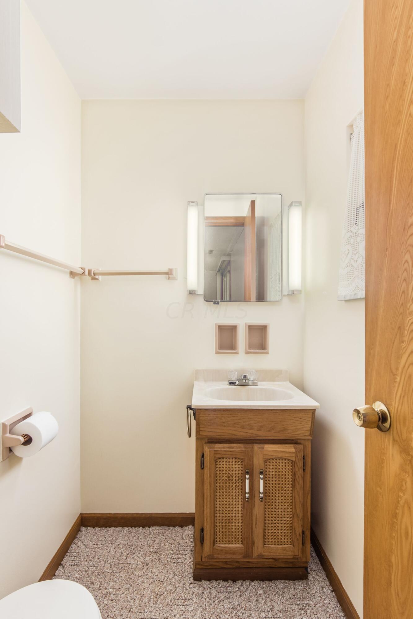 753 Chaffin Ridge Columbus, OH 43214 - Photo 11 of 25 Convenient half bath off the family room.