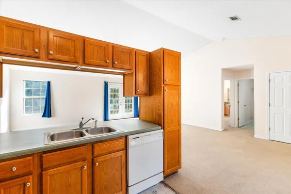 a bathroom with a sink double vanity and a mirror
