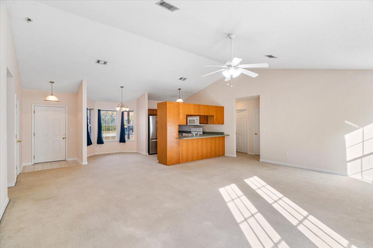 4640 Bobolink Way Crestview, FL 32539 - Photo 16 of 39 a view of a kitchen with a sink and a refrigerator